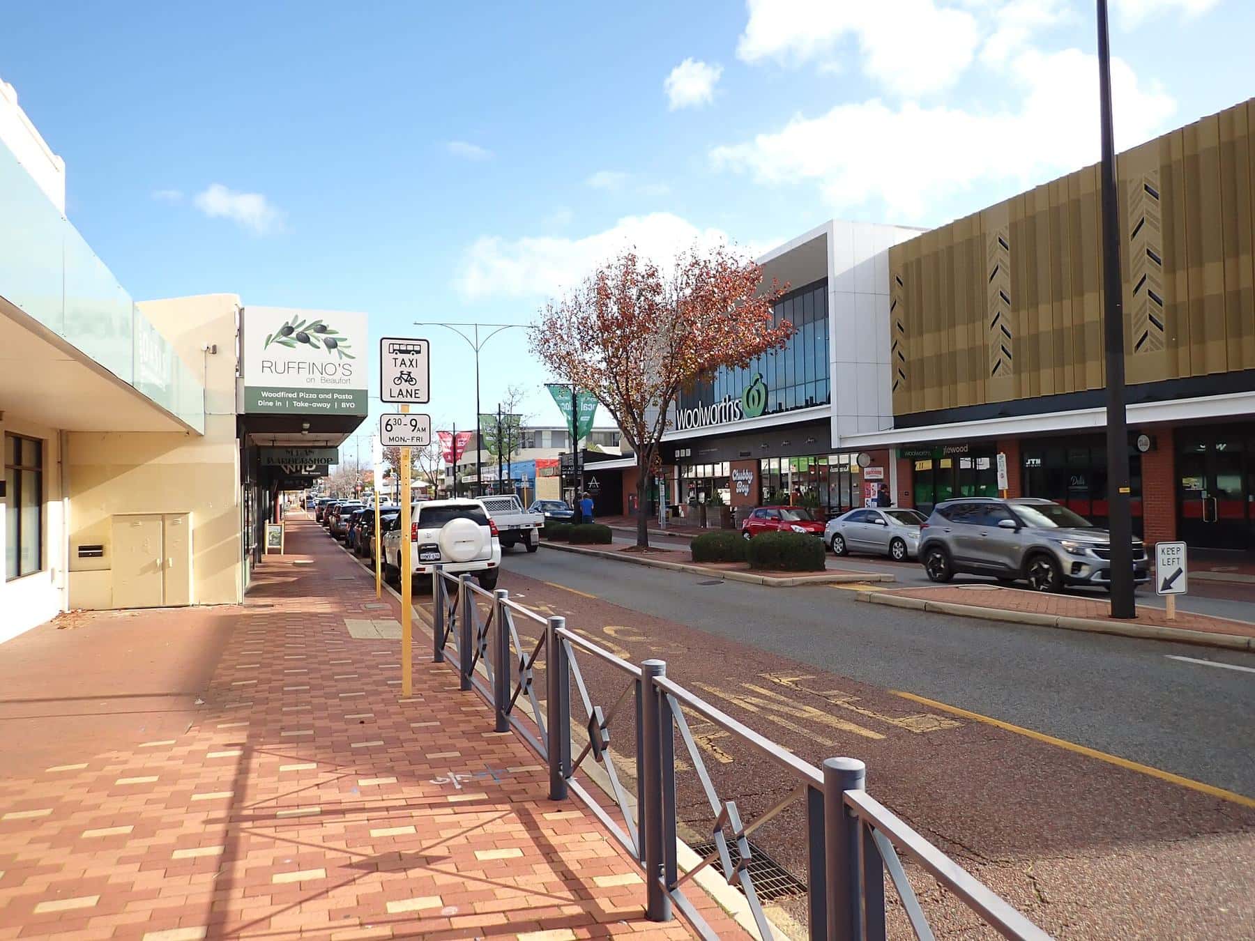 Shops and street trees along Beaufort Street in Inglewood